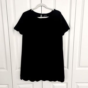 Black dress with scallop bottom & scallop sleeve detail